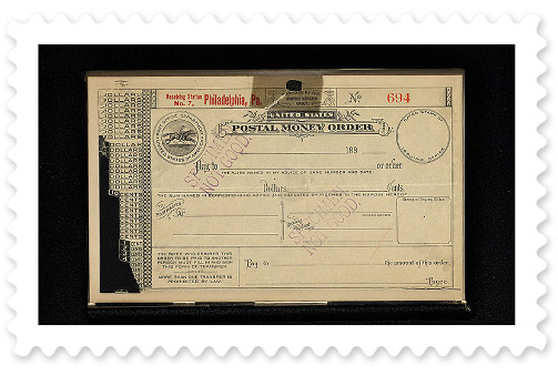 A yellowish-brown antique postal money order with a Post Office Department seal in the upper right corner.