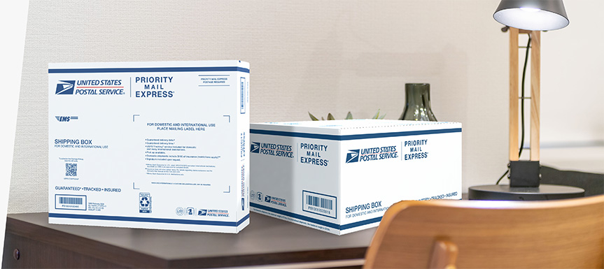 Two Priority Mail Express® boxes sitting on a table.