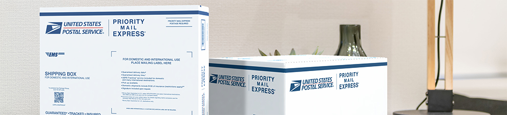 Two Priority Mail Express® boxes sitting on a table.